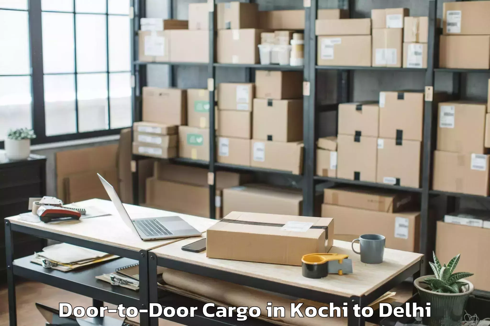 Book Kochi to Defence Colony Door To Door Cargo Online